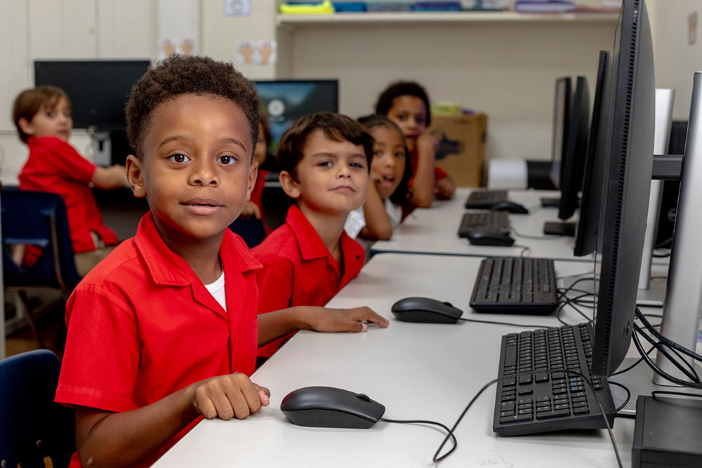 Pupils studying on computers