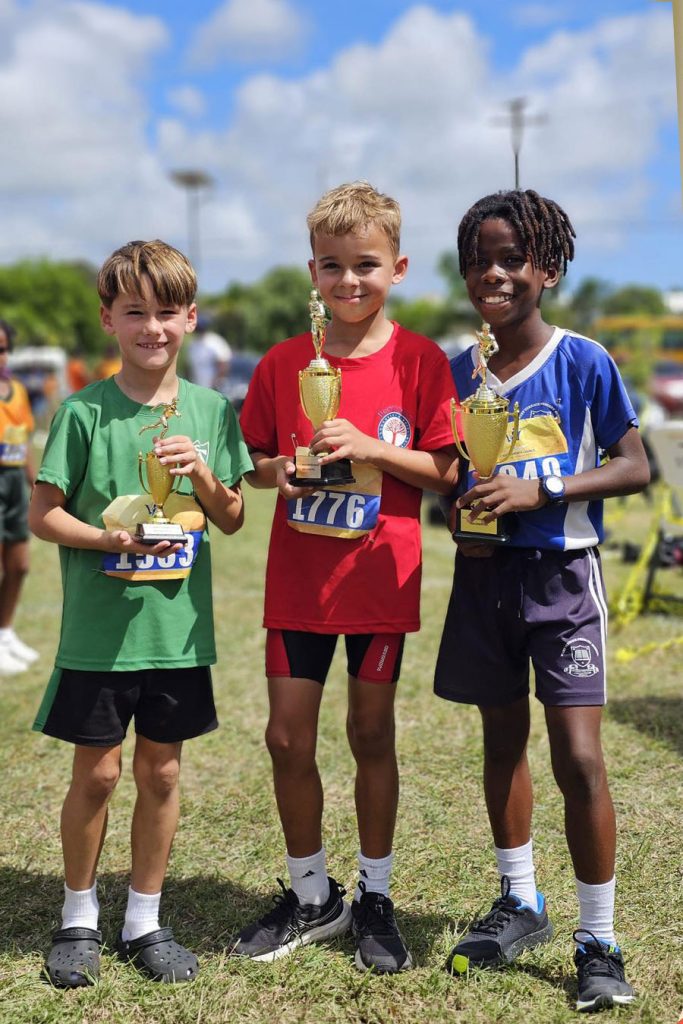 Winning pupils with their tophies