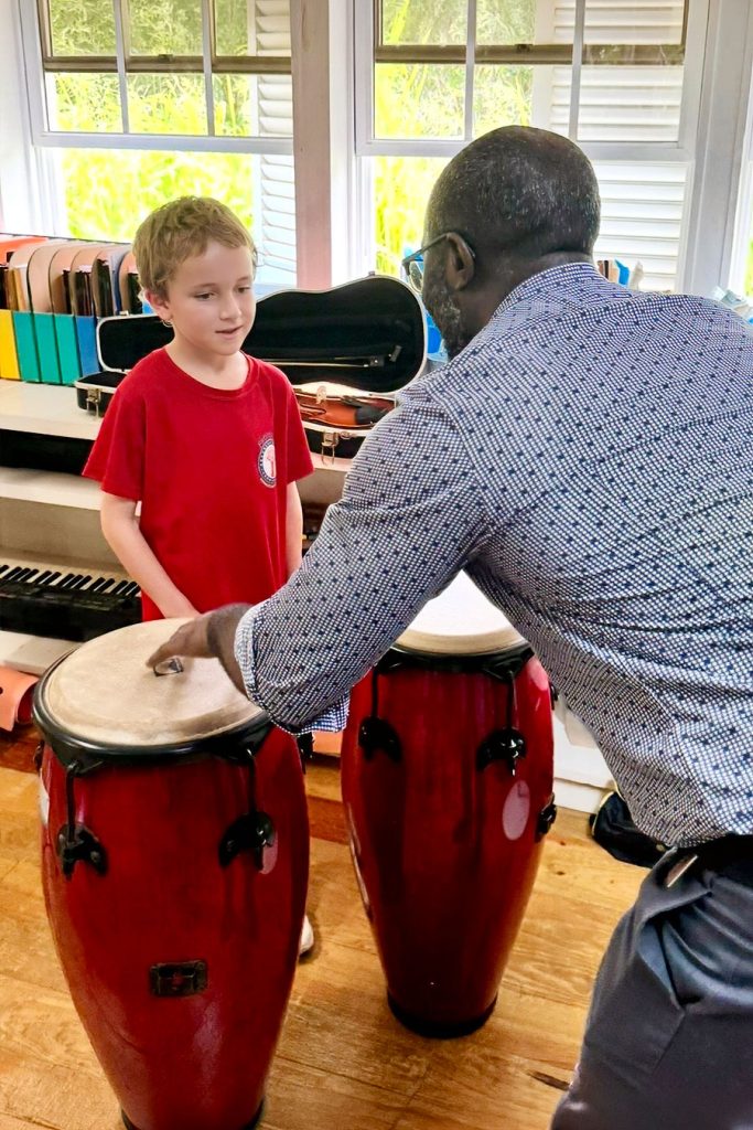 Teacher-and-pupil-learning-the-drums